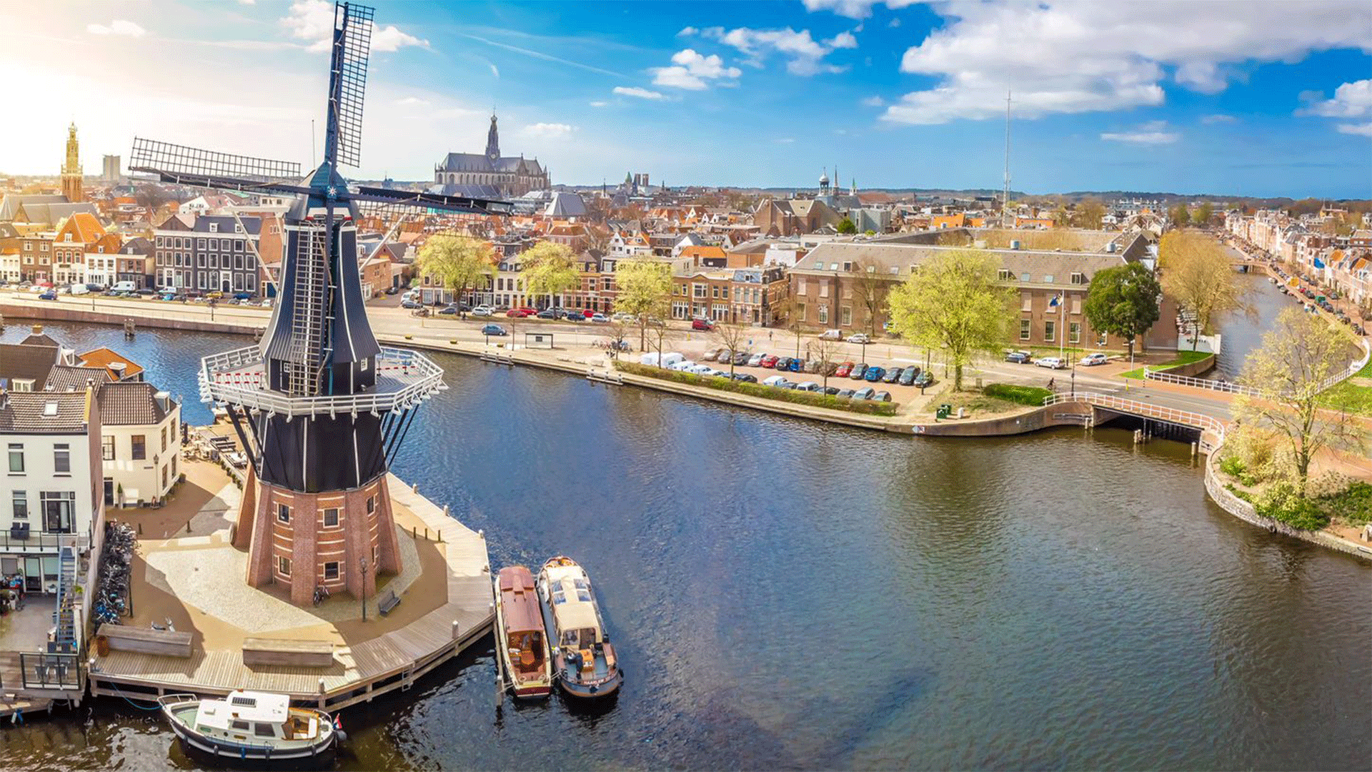 An aerial shot of Haarlem's river and windmill