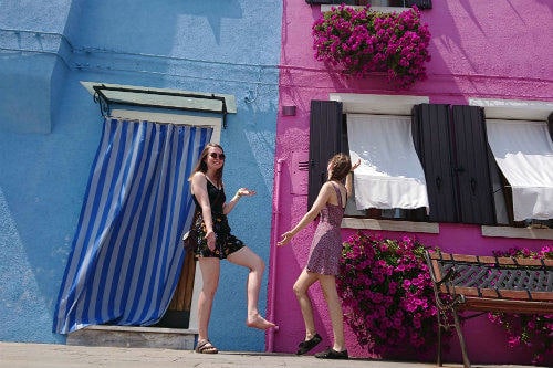 two_girls_being_silly_in_burano_venbice_italy_resized