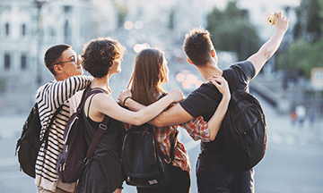 group-of-friends-travellers-taking-selfie