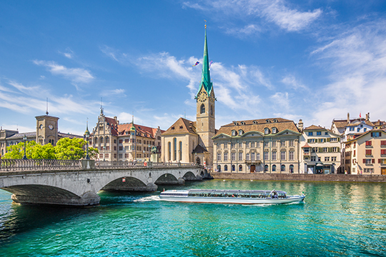 A river with historic buildings lining it