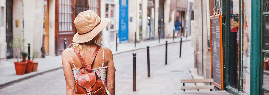 masthead-traveller-woman-walking-in-historic-streets