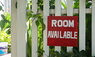 room-available-sign-staying-the-night-with-locals