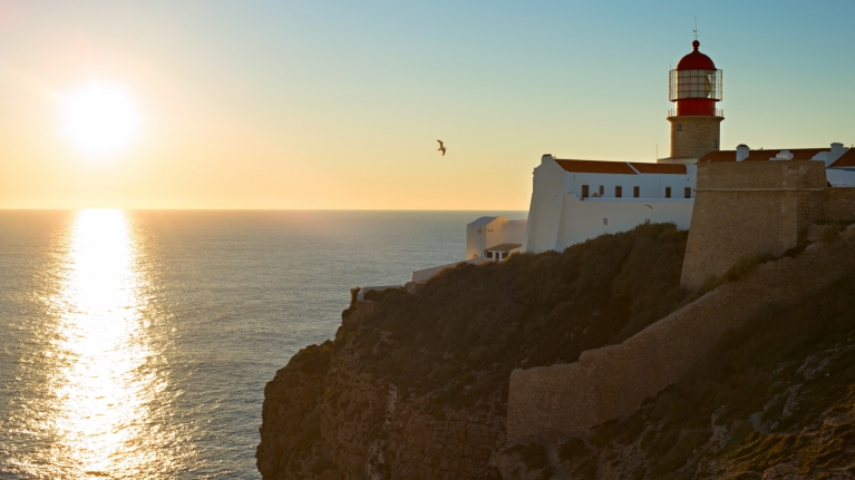 portugal-sagres-sunset-cliff-lighthouse-bird