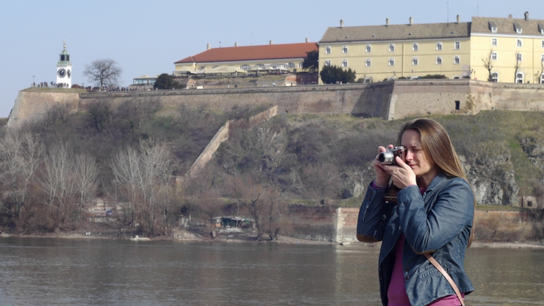 serbia-novi-sad-petrovarian-fortress-woman-taking-pictures