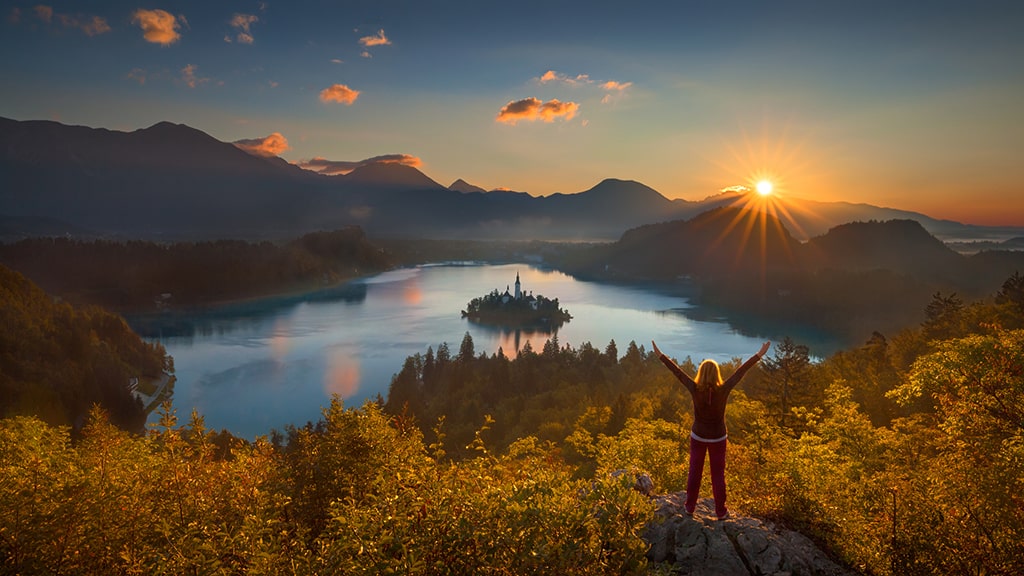 slovenia-lake-blade-sunrise-woman