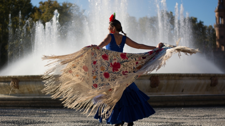 spain-granada-woman-dancing-flamenco