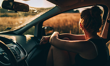 avis-car-rental-girl-looking-out-of-car-window