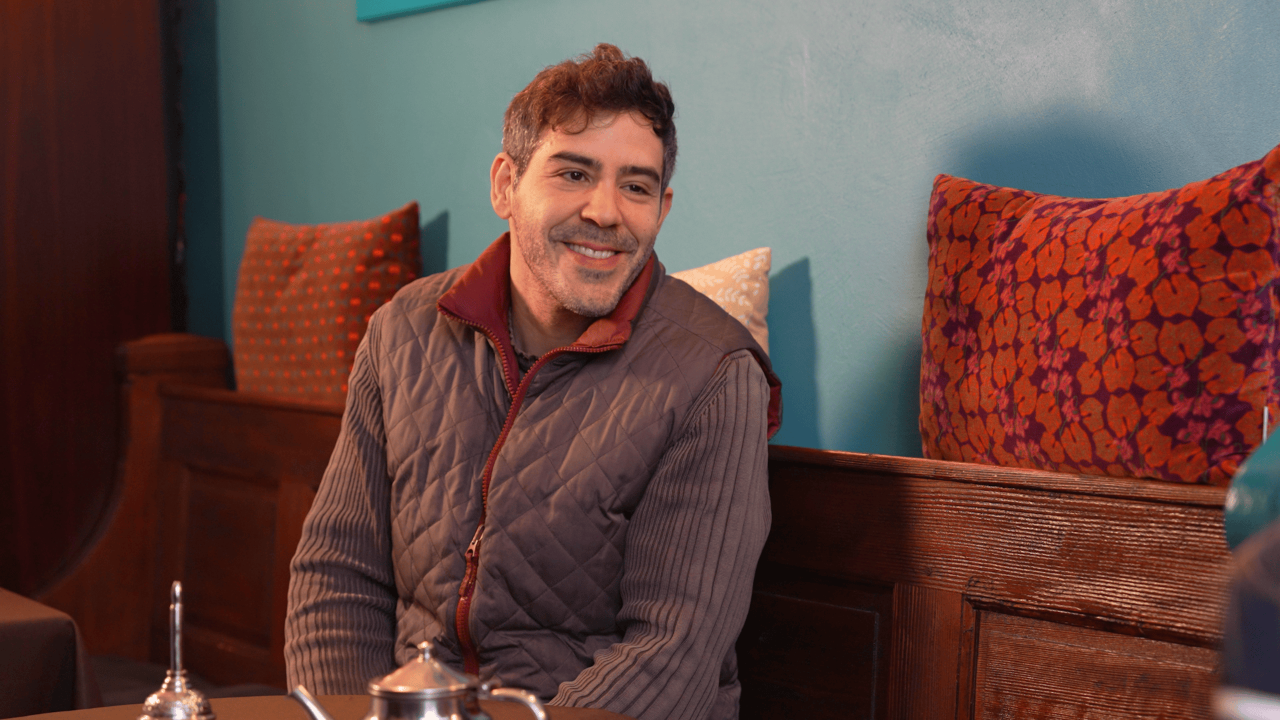 A portrait of Klifa as he sits for an interview with Eurail